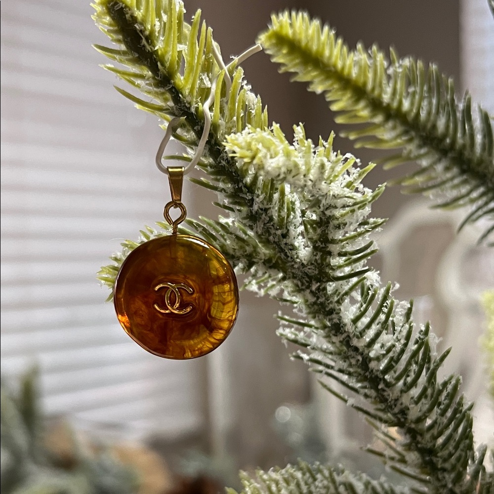 CHANEL Golden Amber button pendant